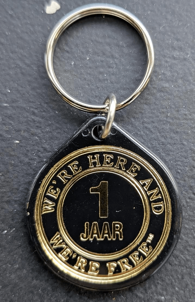 1 jaar plastic coin 